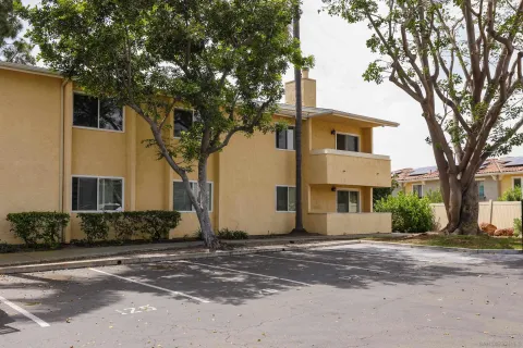 a front view of a building with street view