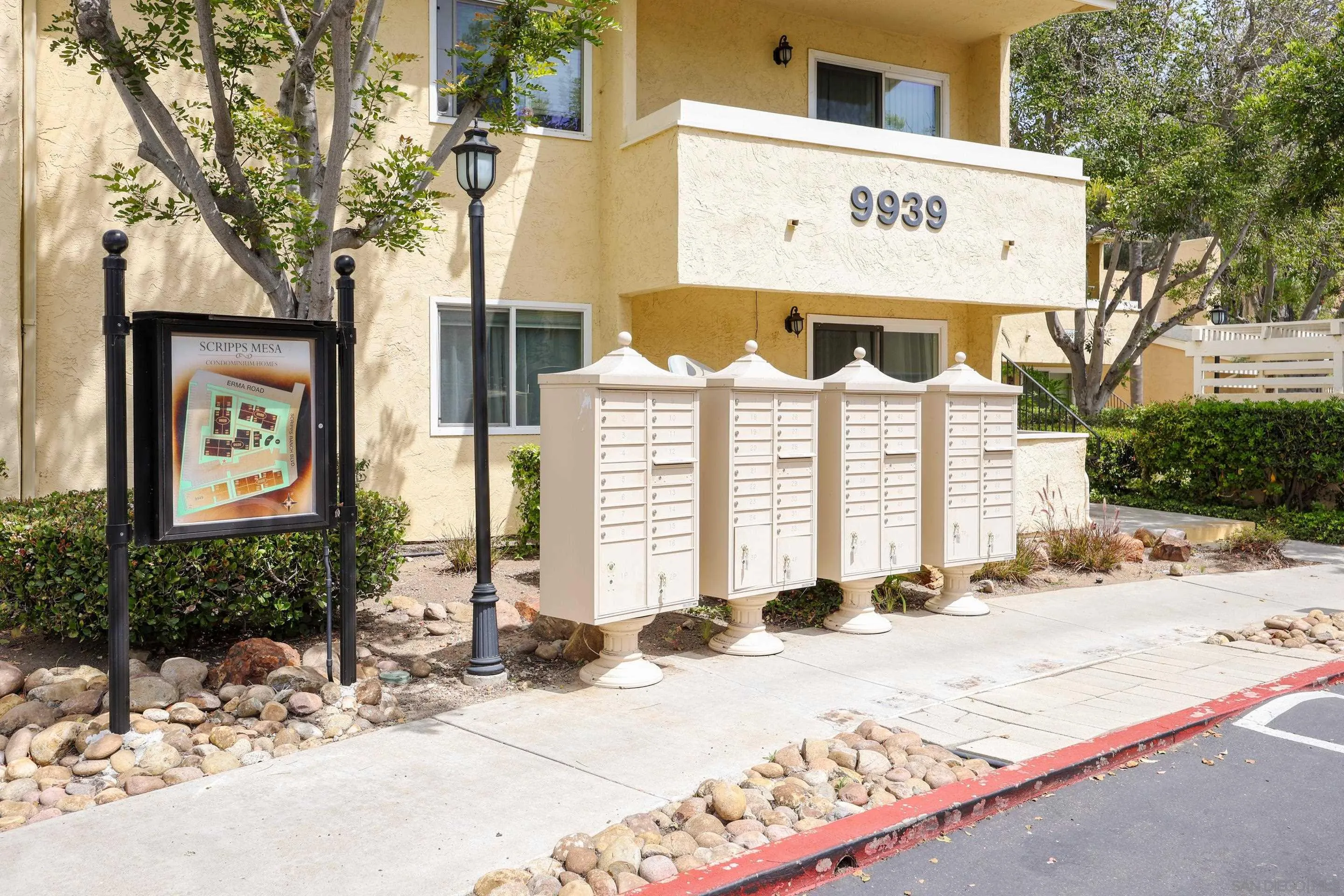9949 Erma Road, Unit 203 San Diego, CA 92131 - Photo 38 of 43 a front view of a building with street view