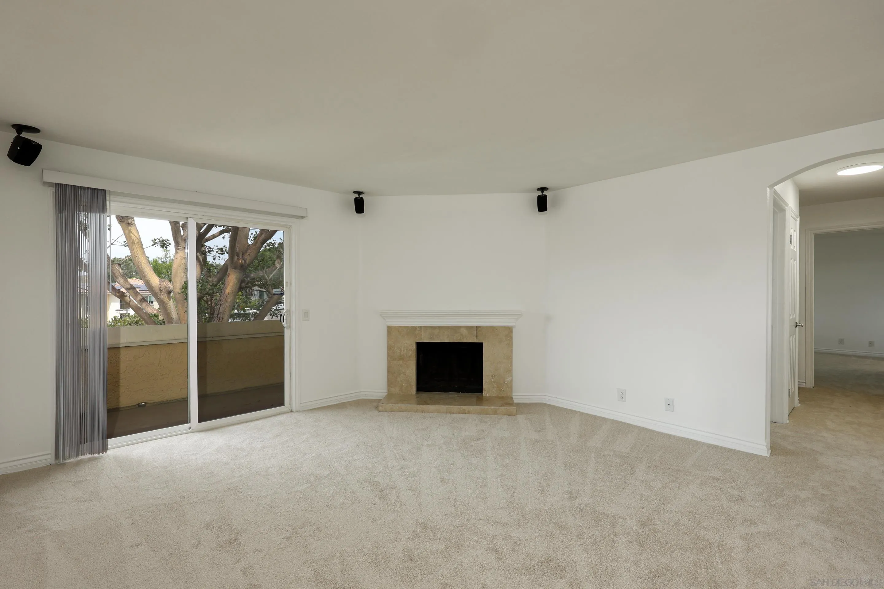 9949 Erma Road, Unit 203 San Diego, CA 92131 - Photo 5 of 43 an empty room with windows