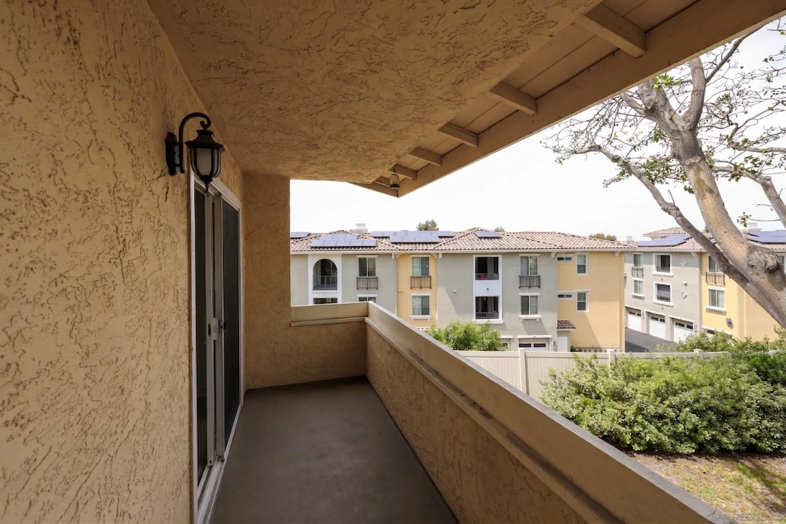 9949 Erma Road, Unit 203 San Diego, CA 92131 - Photo 7 of 43 a view of a house with a sink and garden