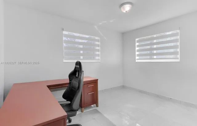 a room with windows and closet