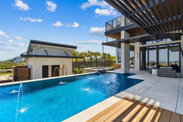 a bedroom with a bed and lamp with window