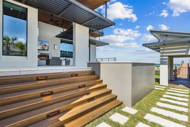 a bathroom with a sink vanity and a toilet
