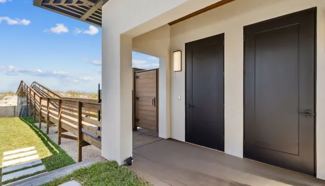 a view of a balcony with an ocean