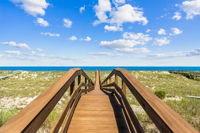 a view of a balcony with a patio