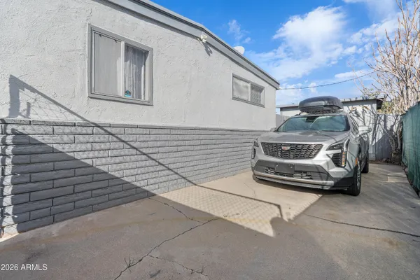 a car parked in front of a house