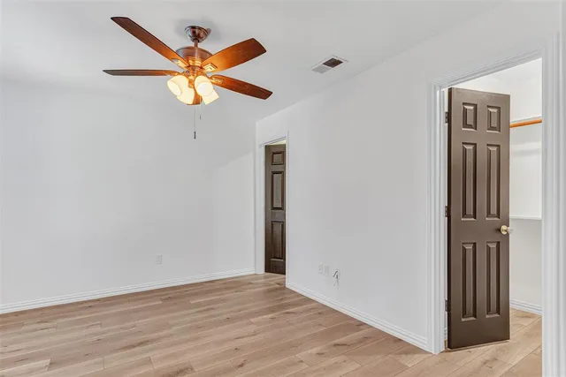 a view of a livingroom with wooden floor