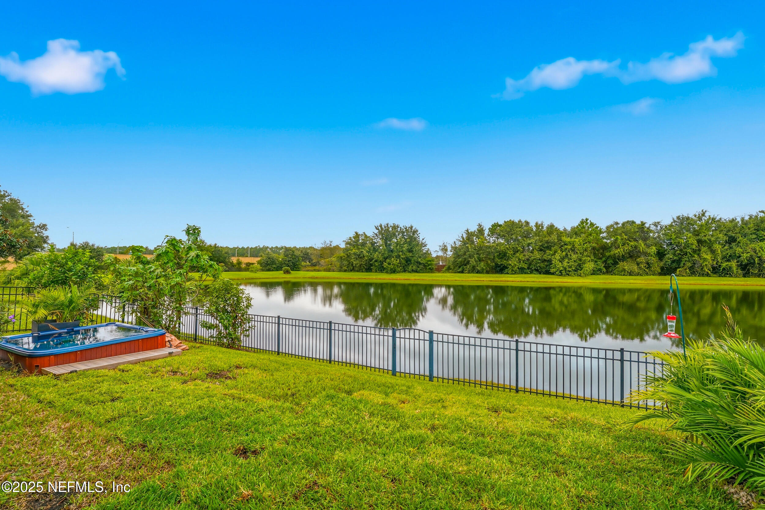 5877 Wind Cave Lane Jacksonville, FL 32258 - Photo 25 of 44 a view of lake with a bridge