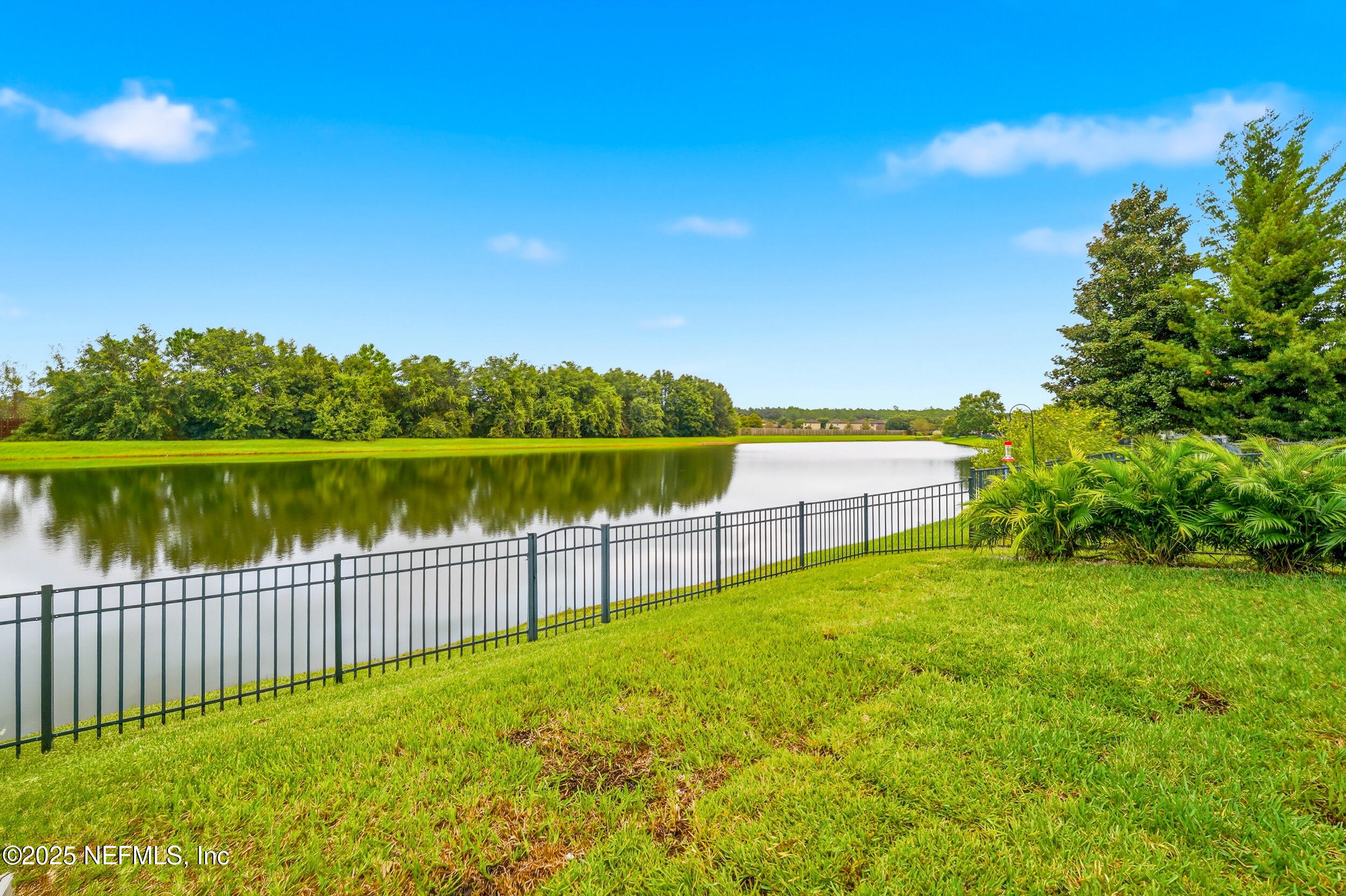 5877 Wind Cave Lane Jacksonville, FL 32258 - Photo 27 of 44 a view of a patio with a yard