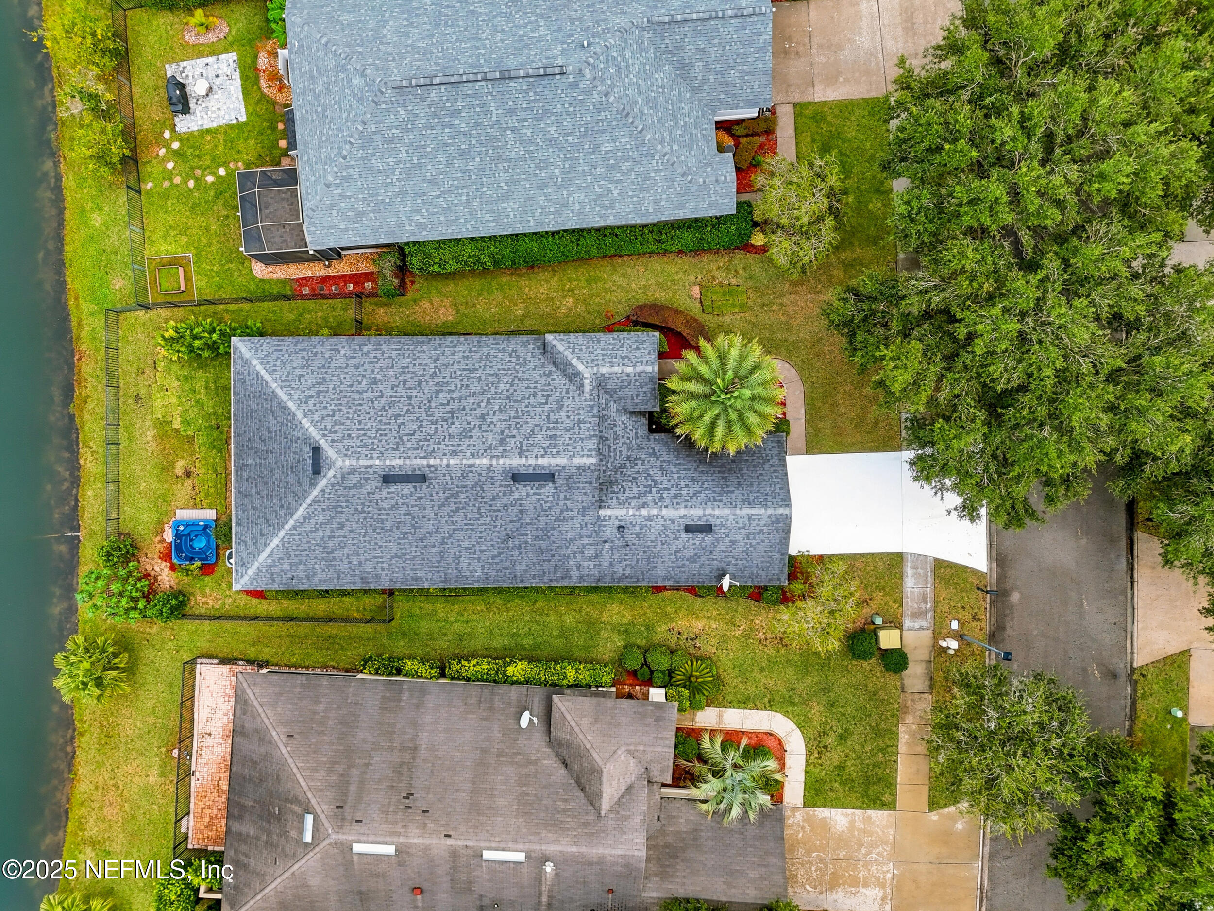 5877 Wind Cave Lane Jacksonville, FL 32258 - Photo 30 of 44 an aerial view of a house with a garden