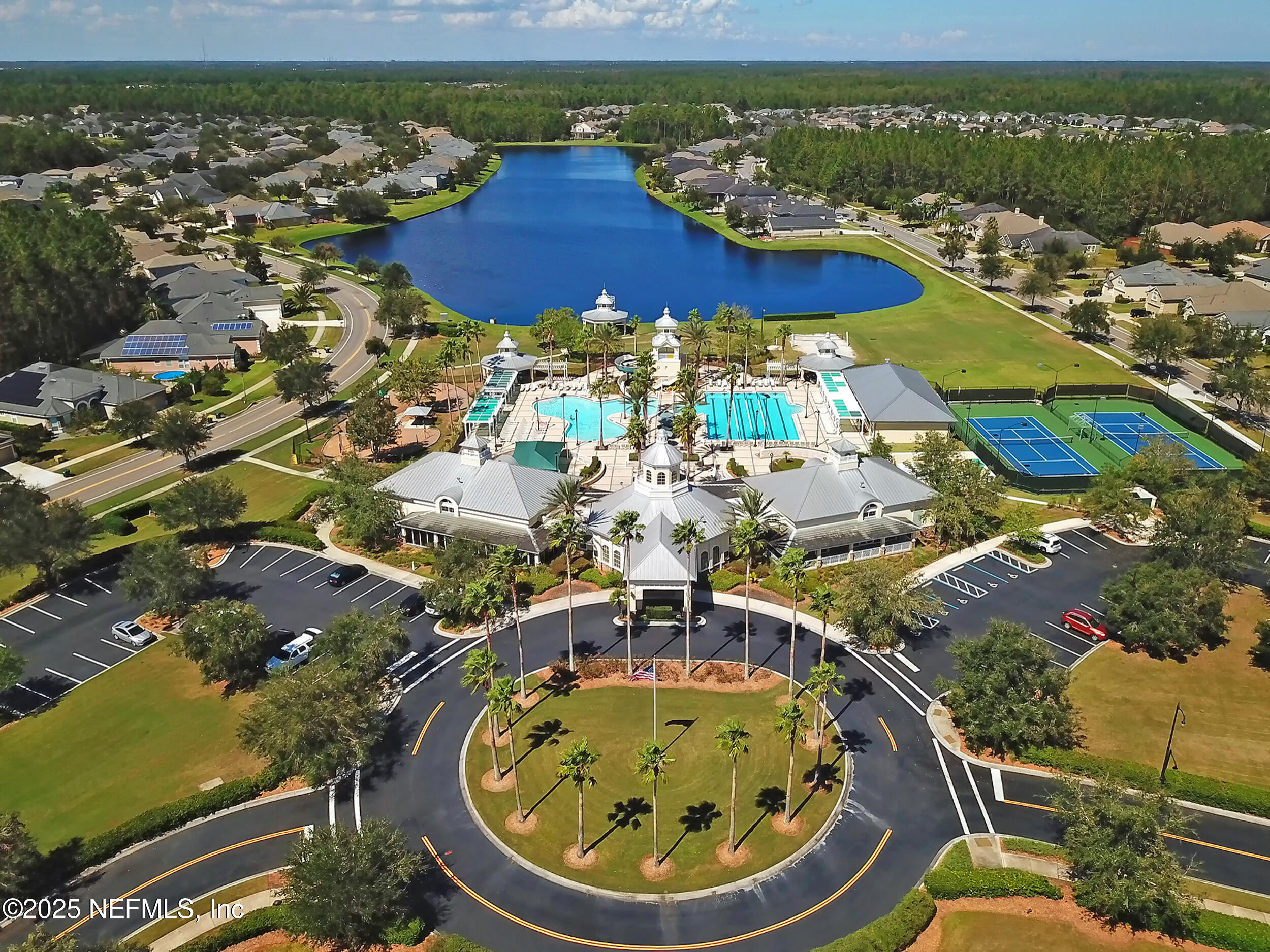 5877 Wind Cave Lane Jacksonville, FL 32258 - Photo 32 of 44 an aerial view of residential houses with outdoor space