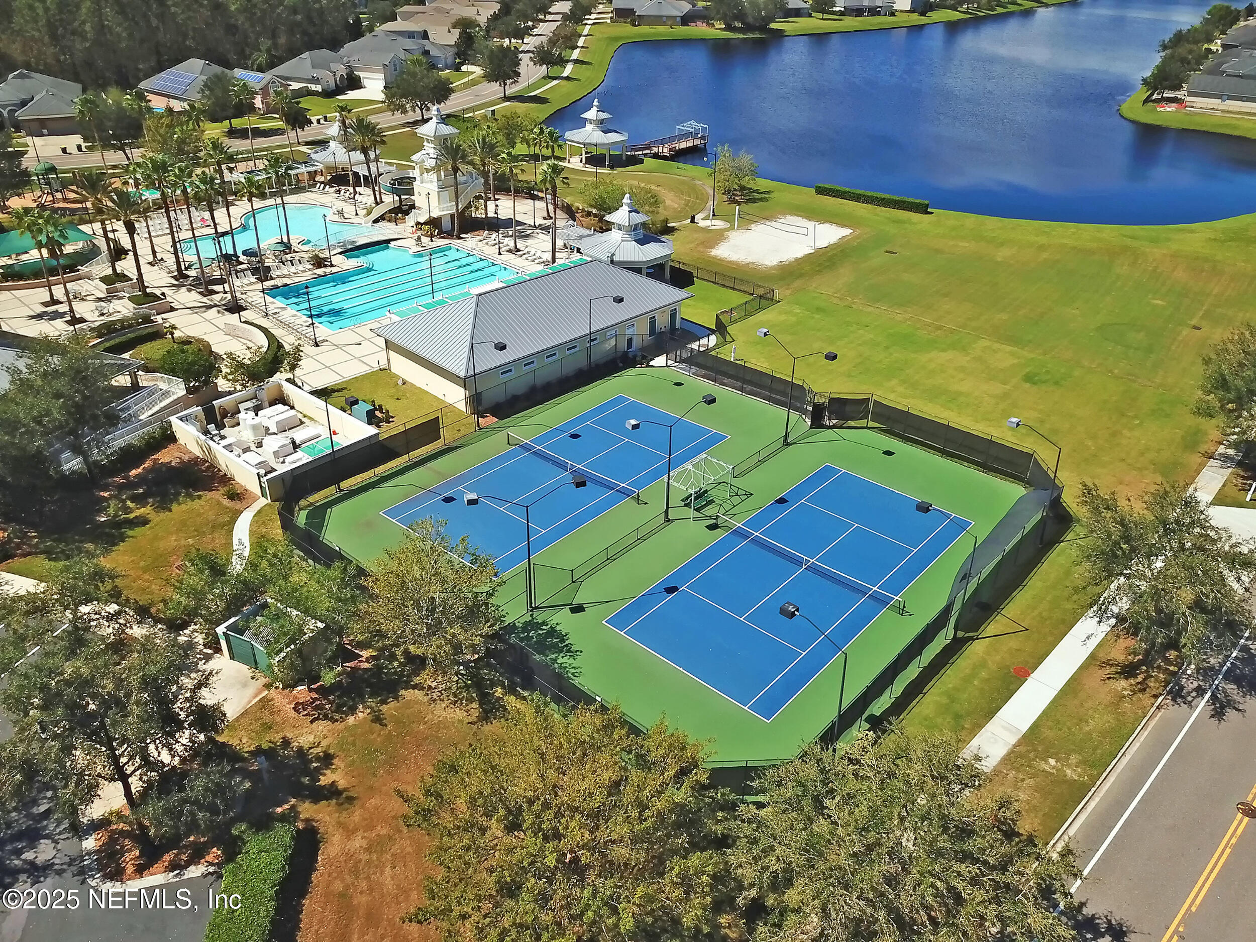 5877 Wind Cave Lane Jacksonville, FL 32258 - Photo 36 of 44 an aerial view of a pool patio yard and outdoor seating
