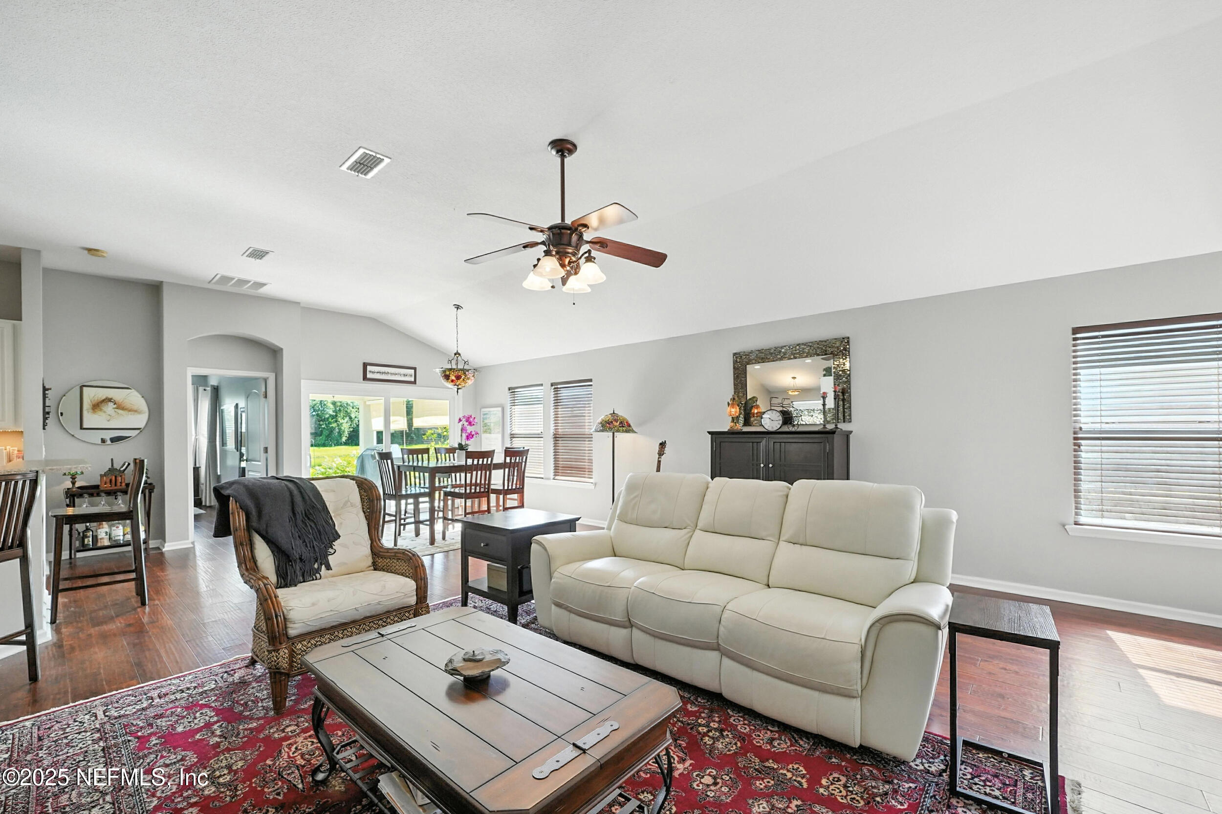 5877 Wind Cave Lane Jacksonville, FL 32258 - Photo 6 of 44 a living room with furniture and a window