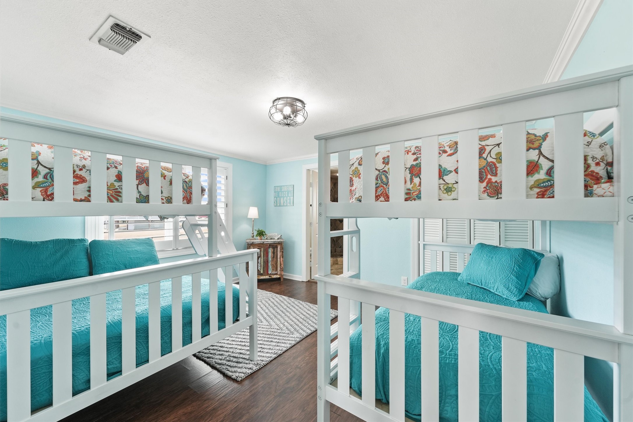 16634 Jamaica Beach Road Galveston, TX 77554 - Photo 22 of 47 a view of a porch with furniture and wooden floor