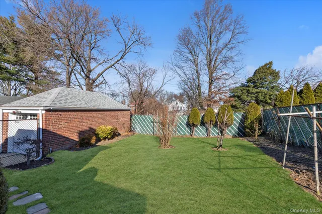 a view of a backyard with a garden