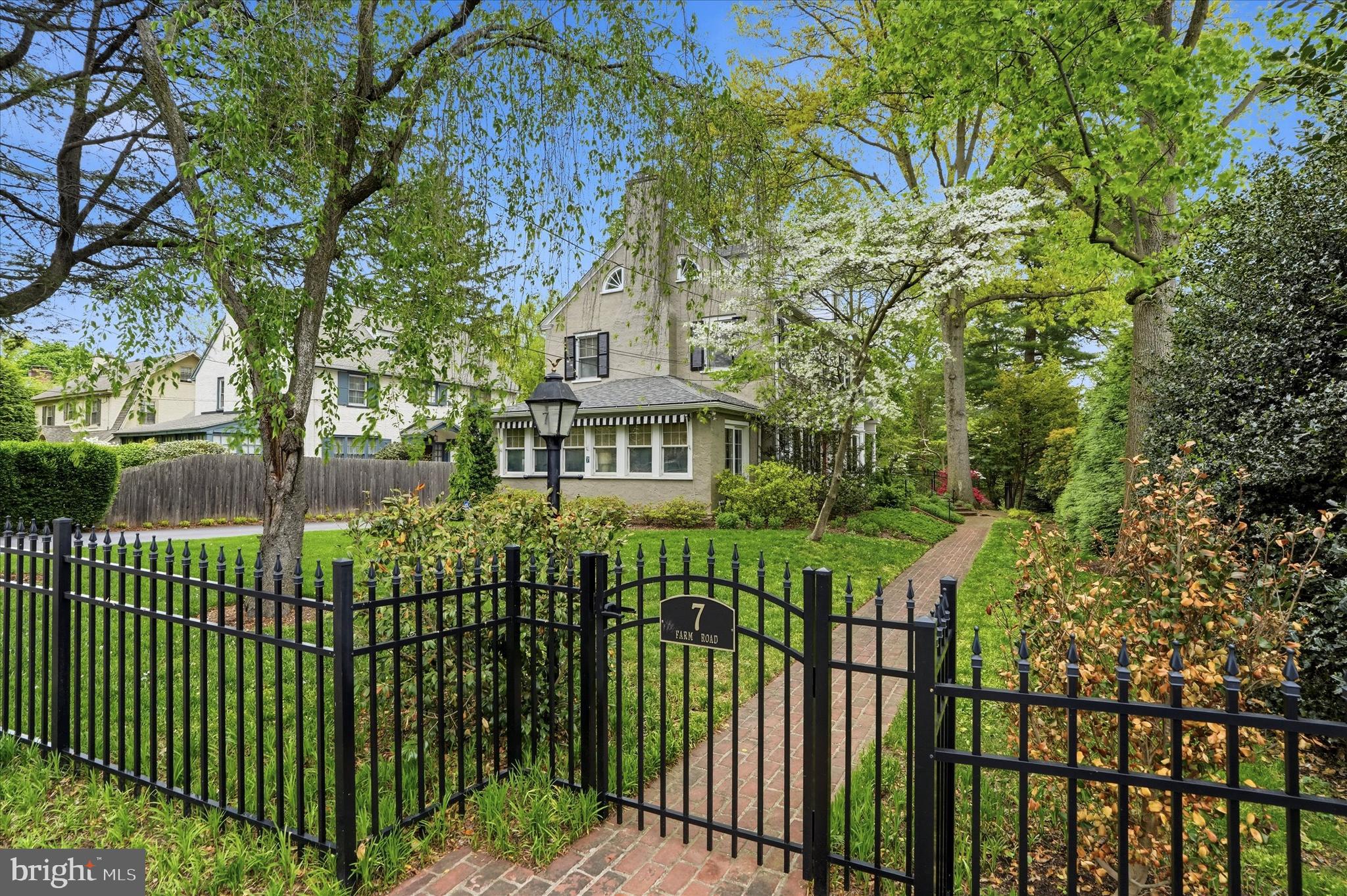 7 Farm Road Wayne, PA 19087 - Photo 3 of 65 a view of a house with a small yard and large trees