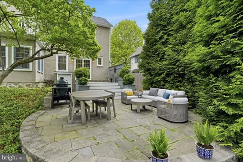 a view of a patio in backyard