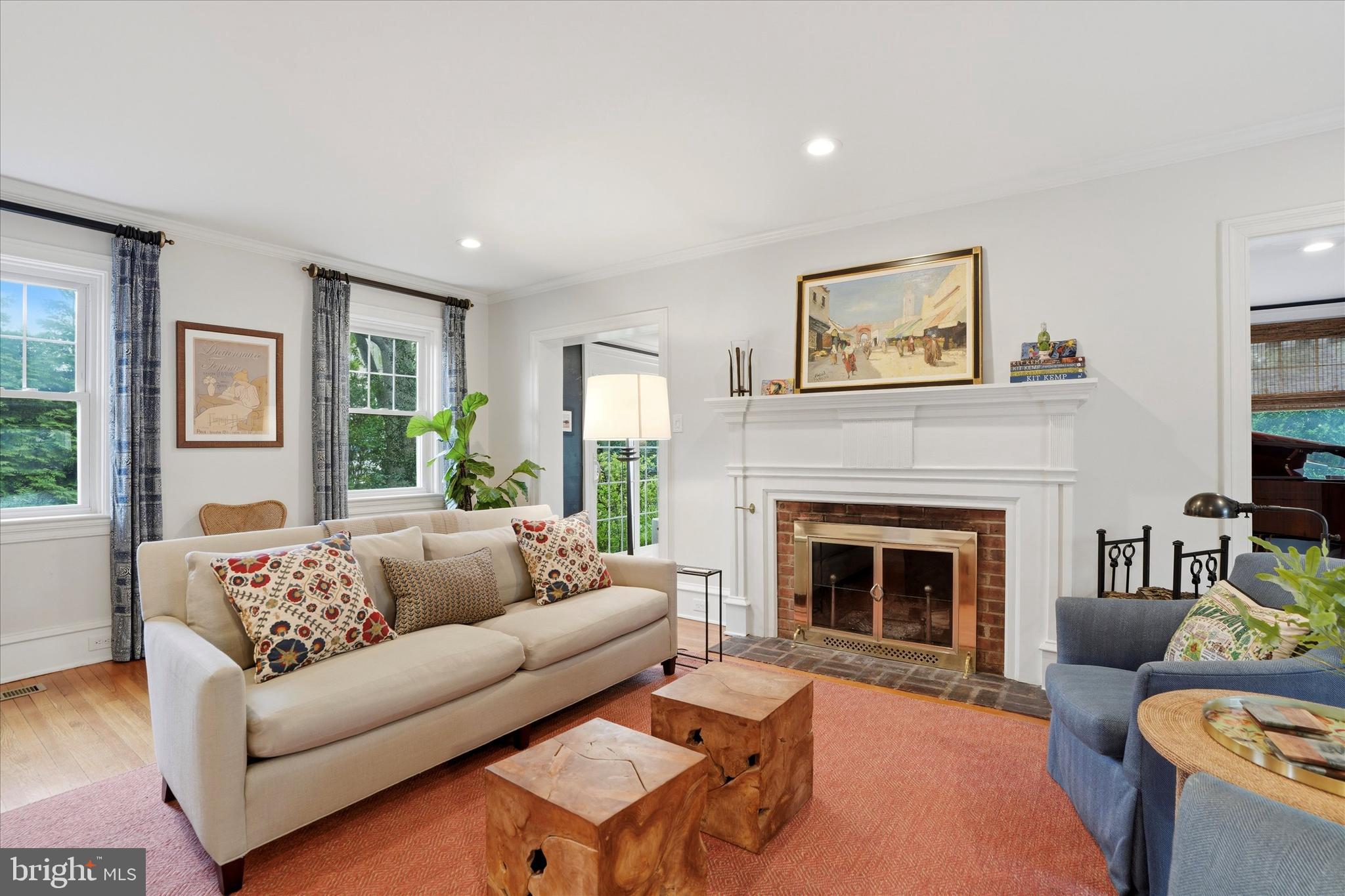 7 Farm Road Wayne, PA 19087 - Photo 10 of 65 a living room with furniture and a fireplace