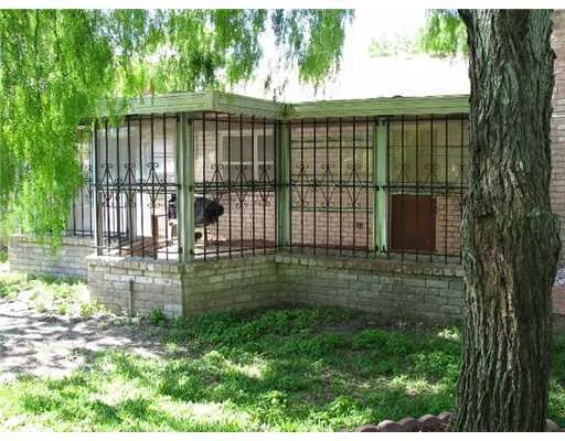 a view of outdoor space and backyard