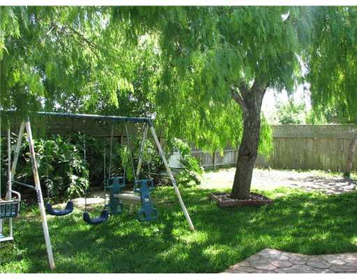 4822 Eider Drive Corpus Christi, TX 78413 - Photo 9 of 9 a view of a yard with a tree