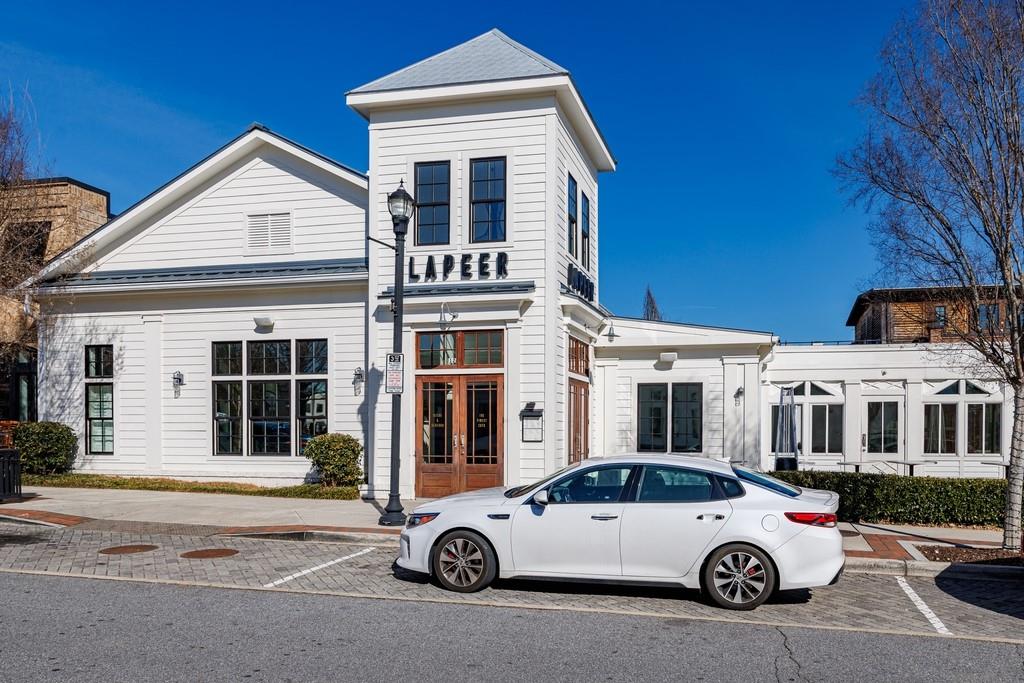 200 Braeden Way Alpharetta, GA 30009 - Photo 46 of 52 a car parked in front of a house