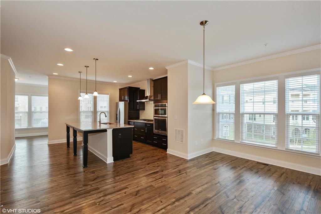 200 Braeden Way Alpharetta, GA 30009 - Photo 9 of 52 a view of kitchen with refrigerator and window