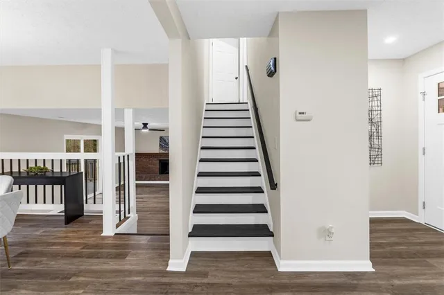 a room with a sink and a mirror