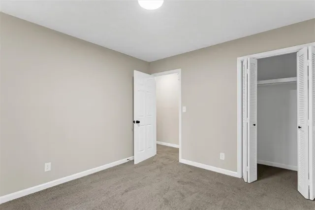 a house with trees in front of it