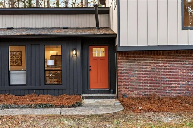 a front view of a house with garage