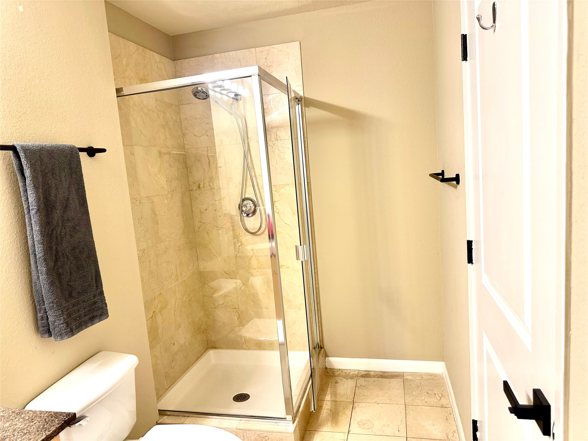 3505 Sage Road, Unit 406 Houston, TX 77056 - Photo 14 of 23 a bathroom with a shower