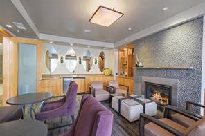 3505 Sage Road, Unit 406 Houston, TX 77056 - Photo 15 of 23 a living room with furniture and a fireplace