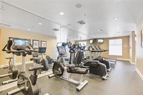 3505 Sage Road, Unit 406 Houston, TX 77056 - Photo 17 of 23 a view of a room with gym equipment