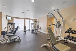 3505 Sage Road, Unit 406 Houston, TX 77056 - Photo 18 of 23 a view of a room with gym equipment