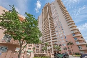 3505 Sage Road, Unit 406 Houston, TX 77056 - Photo 2 of 23 a view of a multi story building