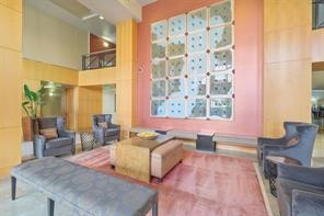 3505 Sage Road, Unit 406 Houston, TX 77056 - Photo 3 of 23 a living room with furniture and wooden floor