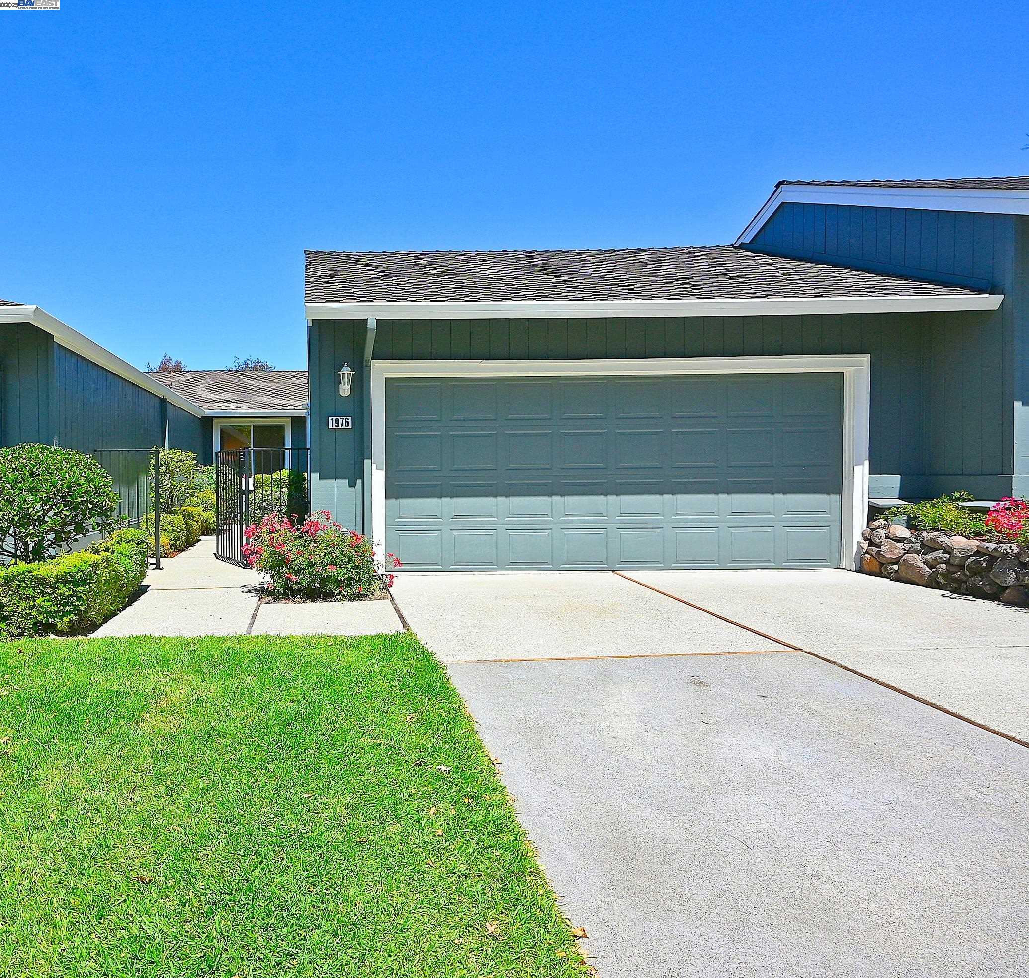 1976 St George Road Danville, CA 94526 - Photo 1 of 1 a front view of a house with a yard and garage