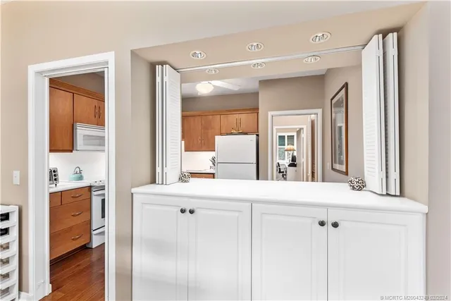 a en suite bathroom with a sink a mirror and a shower