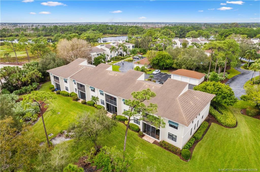 13424 Harbour Ridge Boulevard, Unit 4A Palm City, FL 34990 - Photo 26 of 33 a view of a city from a terrace