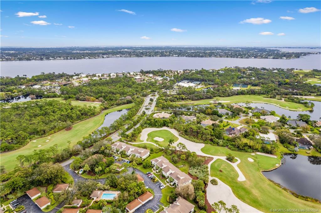 13424 Harbour Ridge Boulevard, Unit 4A Palm City, FL 34990 - Photo 29 of 33 a view of a city with an ocean