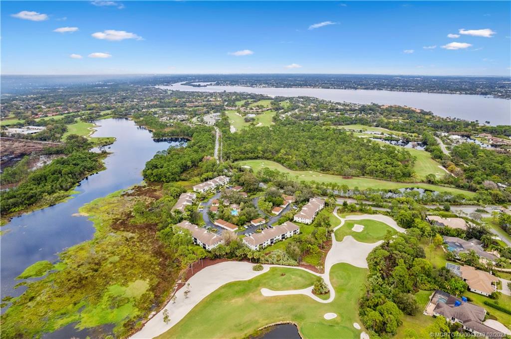 13424 Harbour Ridge Boulevard, Unit 4A Palm City, FL 34990 - Photo 30 of 33 a view of a city with an ocean