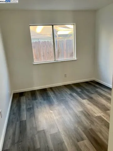 a view of a room that has a window in it