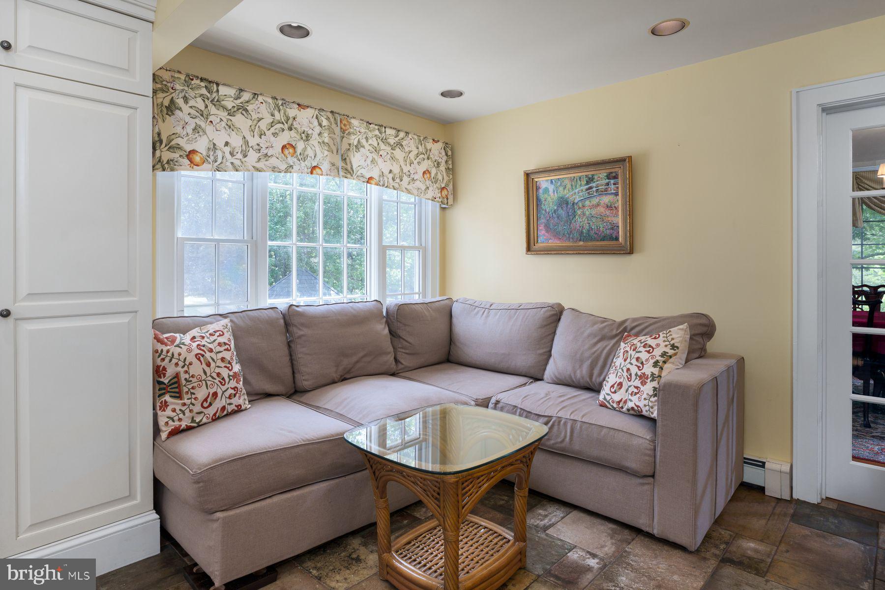 821 Pretty Brook Road Princeton, NJ 08540 - Photo 17 of 32 a living room with furniture and a large window
