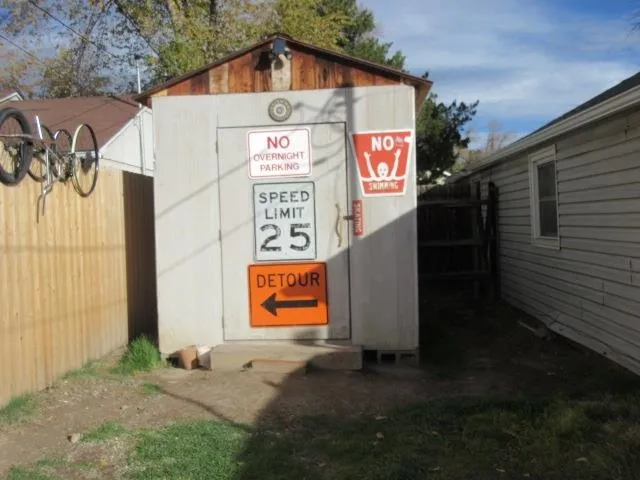 a street sign on a pole on a street
