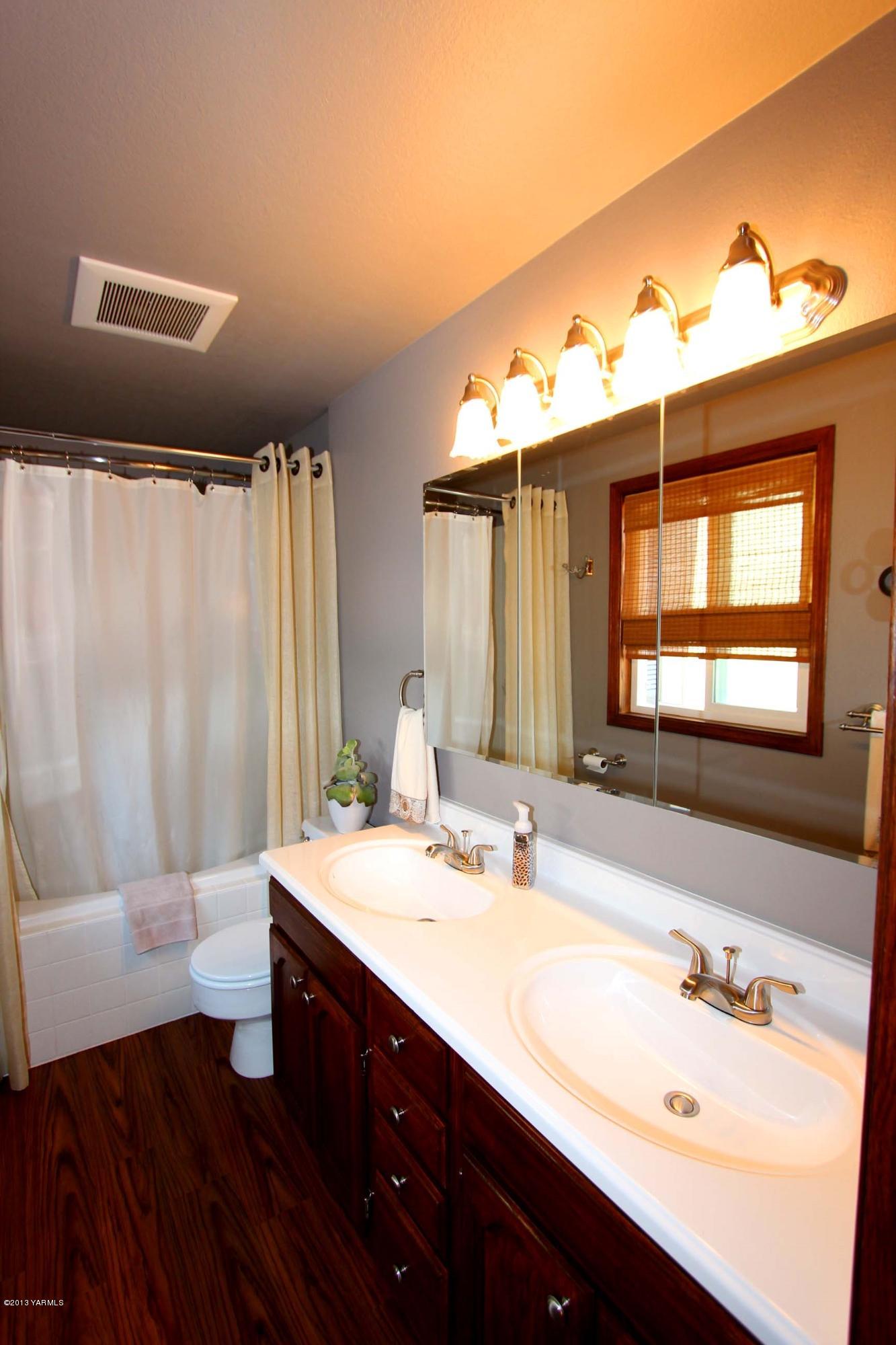 170 Wilcox Road Cowiche, WA 98923 - Photo 22 of 39 a bathroom with a sink and a mirror