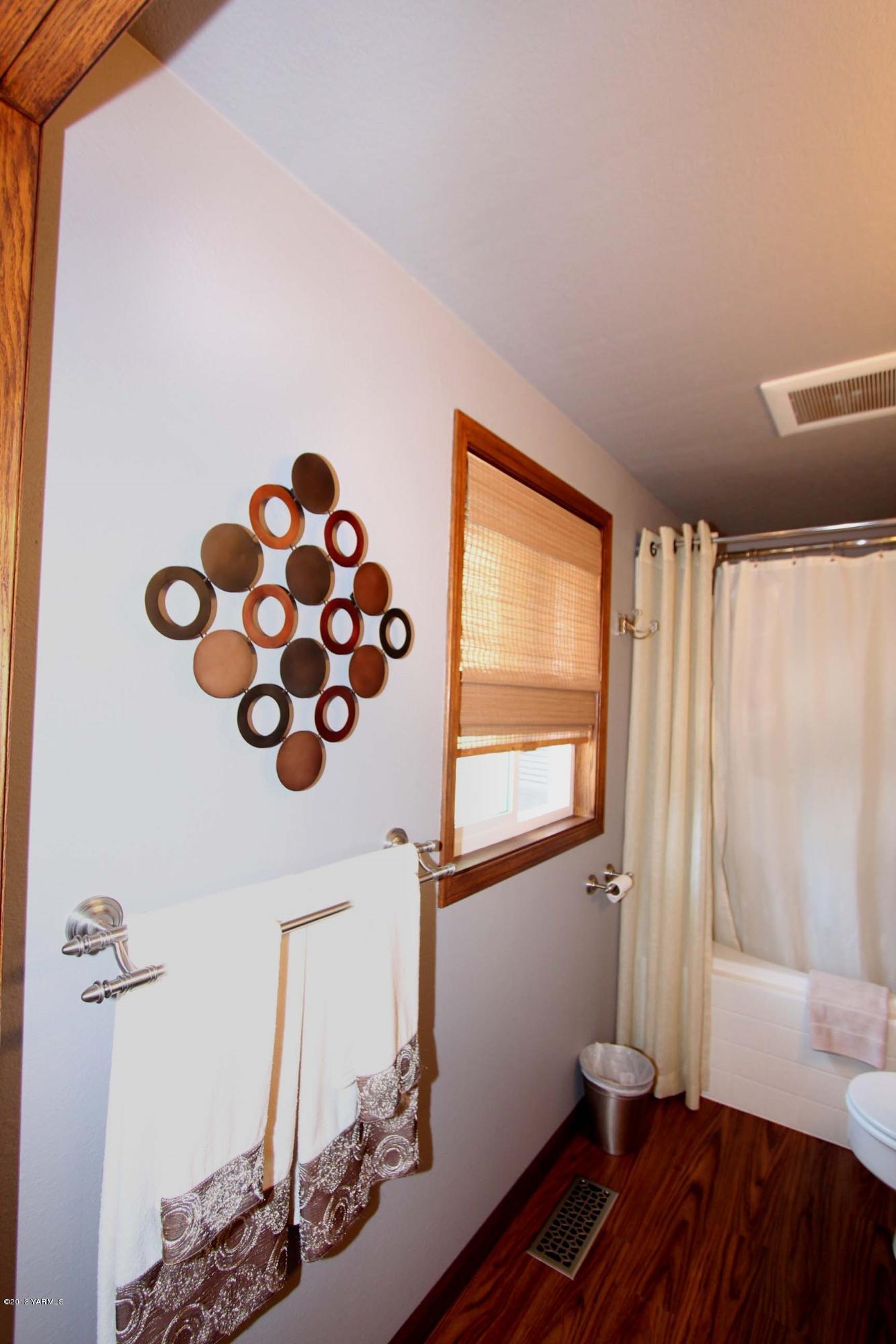 170 Wilcox Road Cowiche, WA 98923 - Photo 23 of 39 a view of a room with wooden floor and window