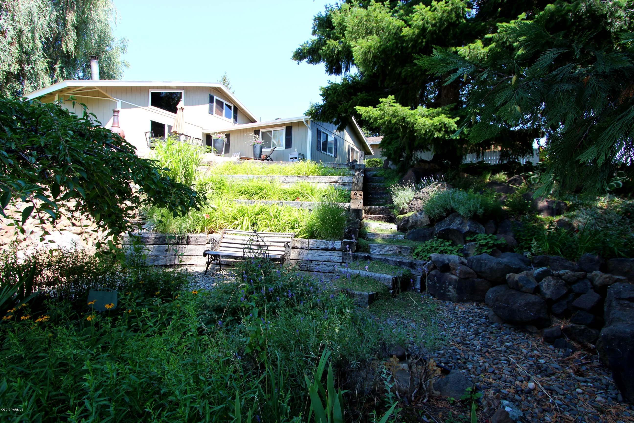 170 Wilcox Road Cowiche, WA 98923 - Photo 36 of 39 a front view of a house with garden