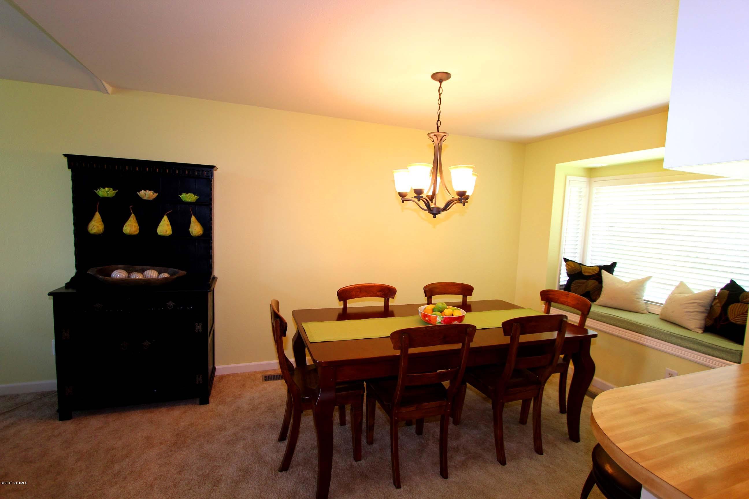 170 Wilcox Road Cowiche, WA 98923 - Photo 9 of 39 a view of a dining room with furniture and chandelier