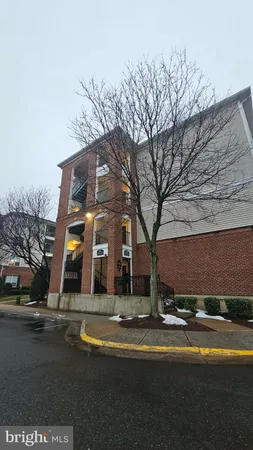 a building with trees in front of it