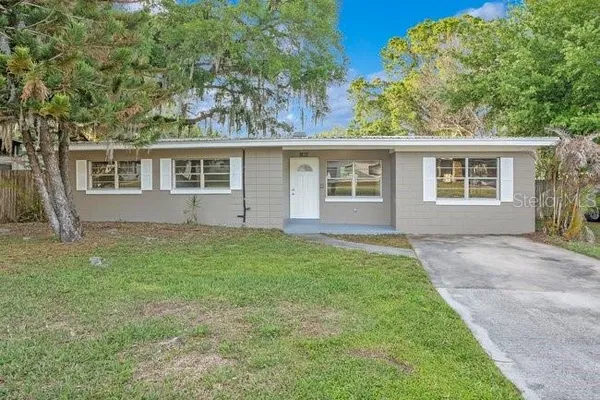 front view of a house and a yard
