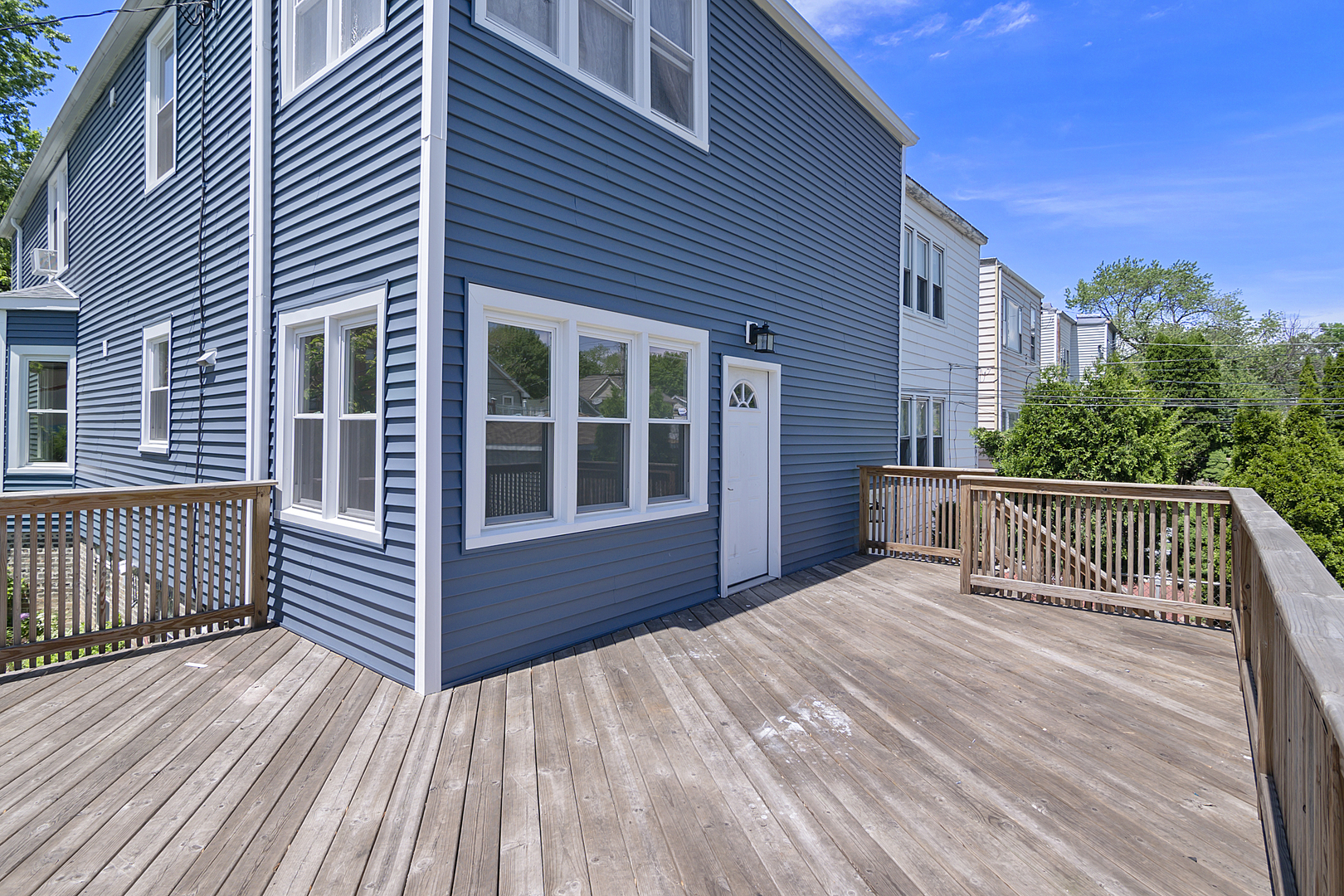 4017 North Spaulding Avenue Chicago, IL 60618 - Photo 17 of 30 a view of balcony with wooden floor and fence